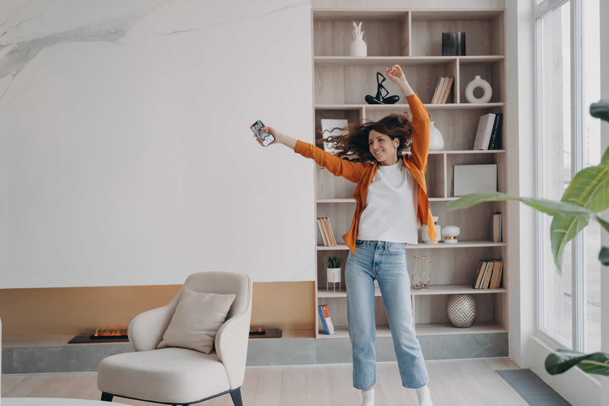 Happy Resident Dancing in Living Room